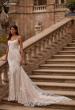 Picture of: Long Lace Mermaid Wedding Gown with Modified Scoop Neck and Corset Back in IINI, Style: B1335, Back Picture